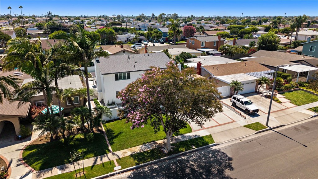 Aerial view shows the home's desirable Huntington Beach neighborhood setting near the coast. - 9162 Brabham Drive, Huntington Beach CA 92646 - photo 57