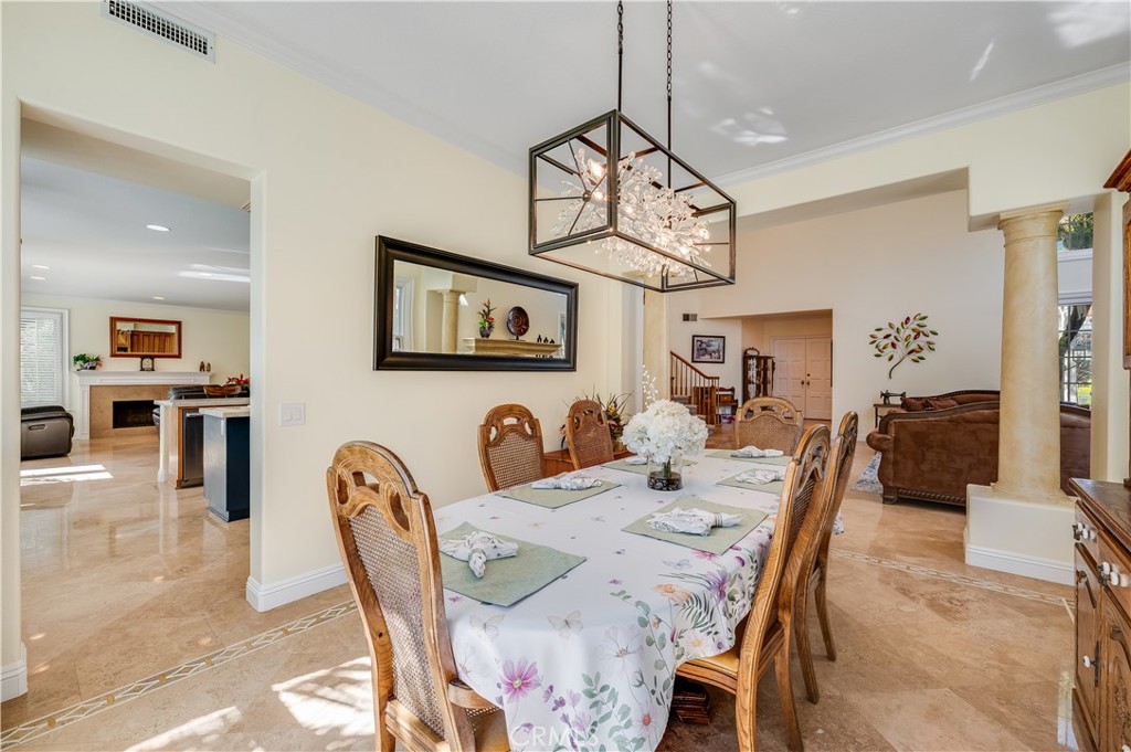 Formal Dining Room looking into the Kitchen and Living Room - 9332 Power, Huntington Beach CA 92646 - photo 10