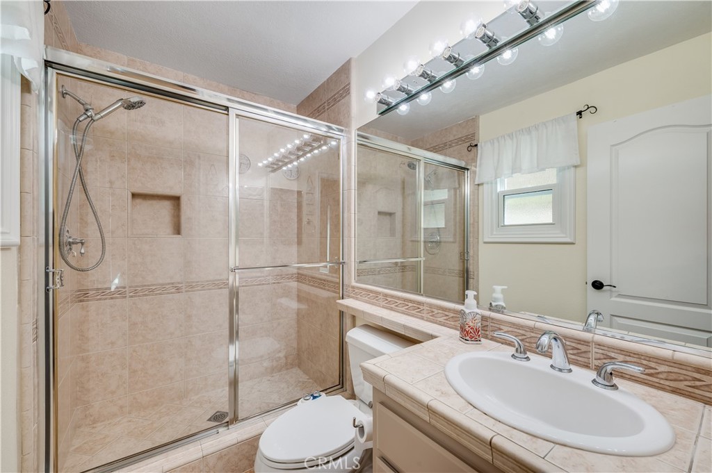 Upgraded Bathroom attached to Downstairs Bedroom - 9332 Power, Huntington Beach CA 92646 - photo 23
