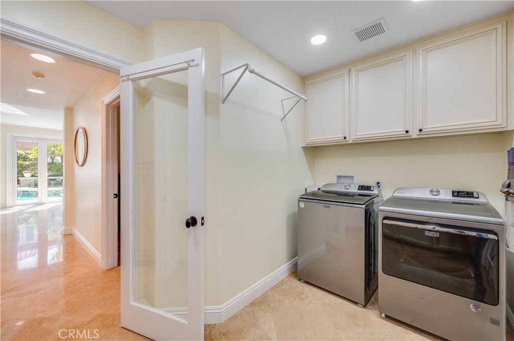 Laundry Room with Cabinetry - 9332 Power, Huntington Beach CA 92646 - photo 25