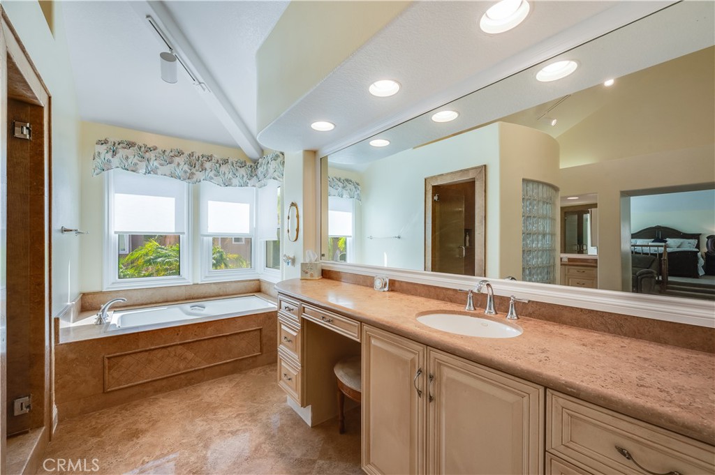Primary Bathroom Large Dressing Area with Soaking Tub and Remote Control Shades - 9332 Power, Huntington Beach CA 92646 - photo 37