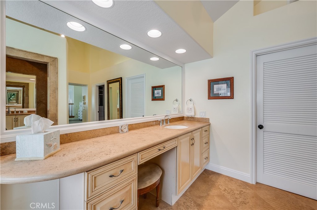 Large Dressing Area with Door Leading into Large Walk-in Closet - 9332 Power, Huntington Beach CA 92646 - photo 38