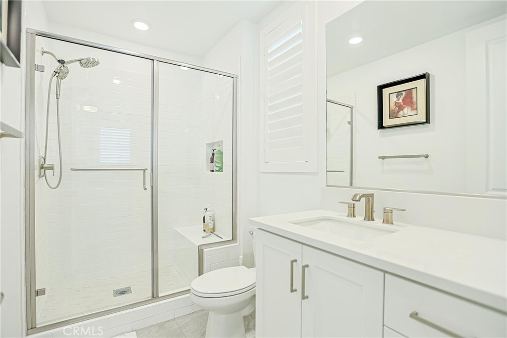 Bathroom 1 inside the Bedroom 1 downstairs - 9622 Gisler Drive, Huntington Beach CA 92646 - photo 9