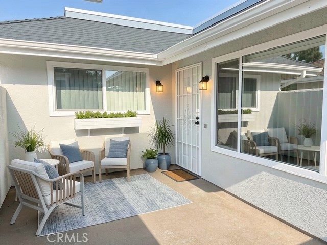 AI enhanced photo of porch to show the possibilities. - 9704 Bickley, Huntington Beach CA 92646 - photo 1