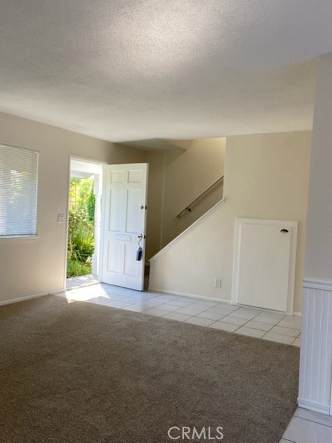 Living room and entry - 9711 Adams, Huntington Beach CA 92646 - photo 12