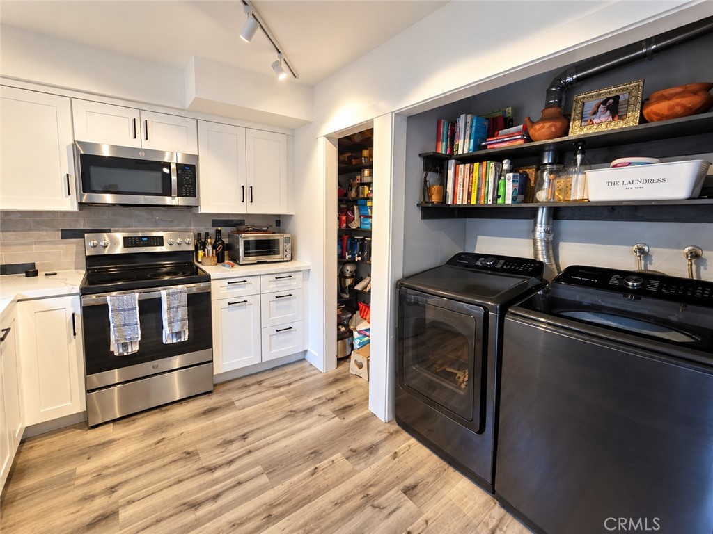 Updated laundry area and walk in pantry - 9857 Continental, Huntington Beach CA 92646 - photo 5