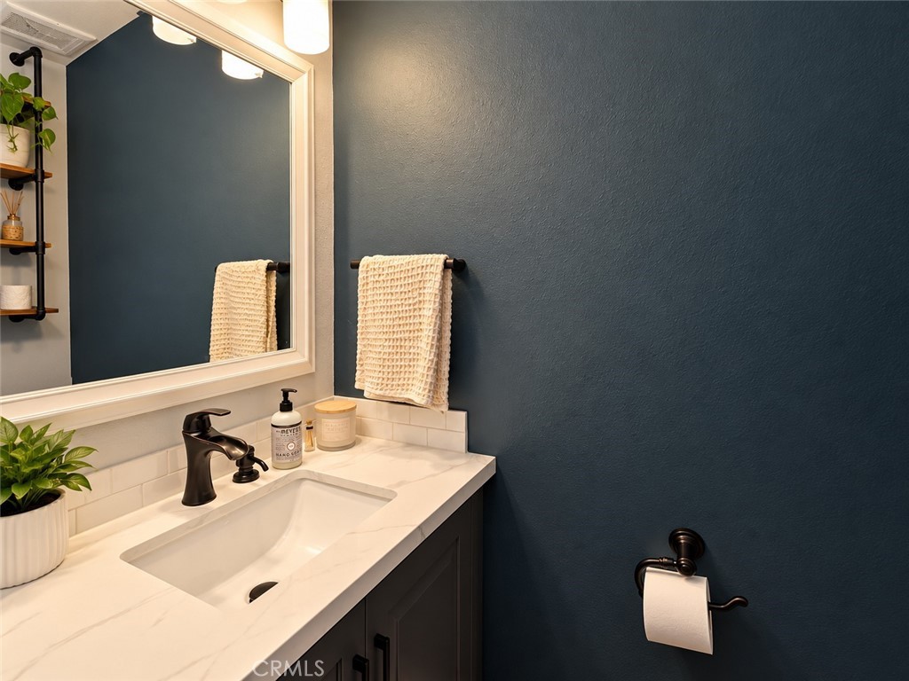 First floor half bath - 9857 Continental, Huntington Beach CA 92646 - photo 7