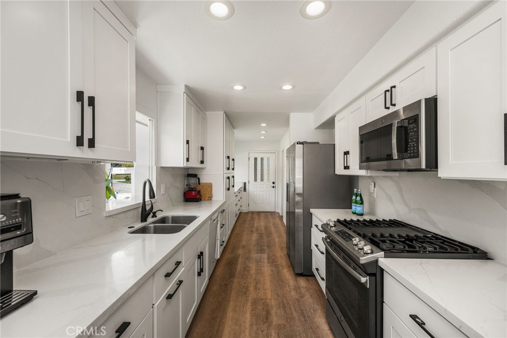 Beautifully remodeled kitchen. - 9921 Barranca Circle, Huntington Beach CA 92646 - photo 5