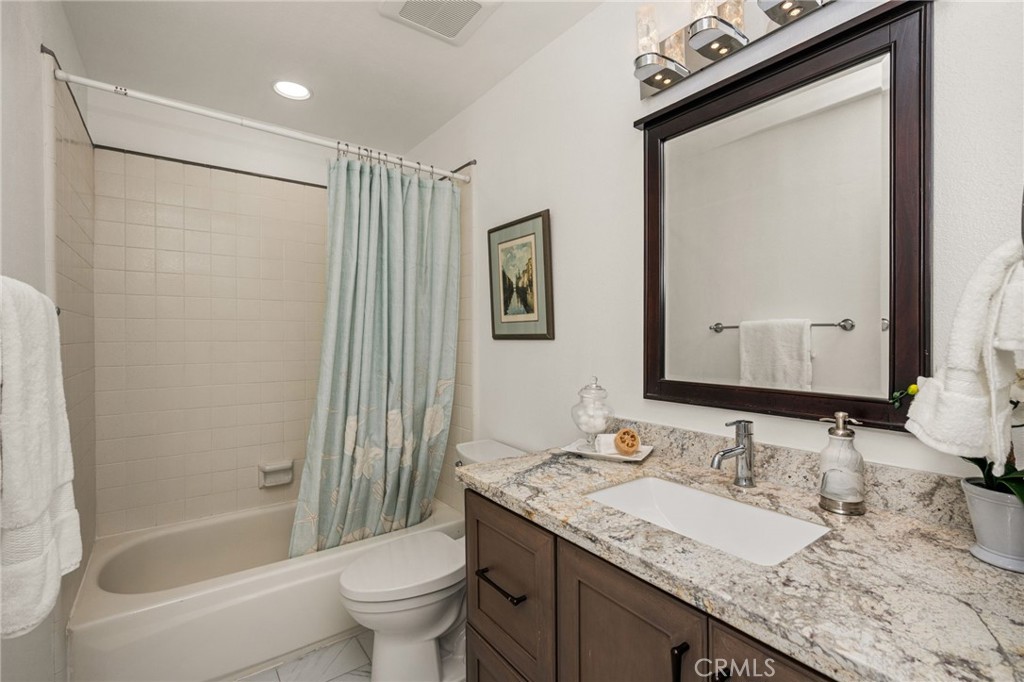 Upstairs guest bathroom. - 9921 Barranca Circle, Huntington Beach CA 92646 - photo 52