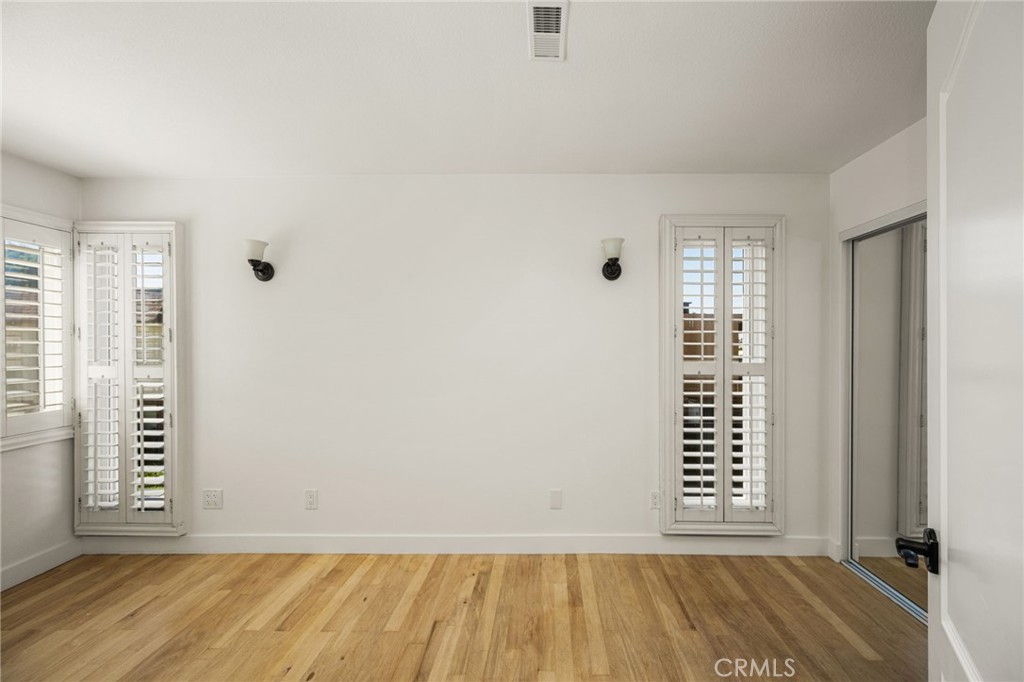 Upstairs bedroom #3. - 9921 Barranca Circle, Huntington Beach CA 92646 - photo 56