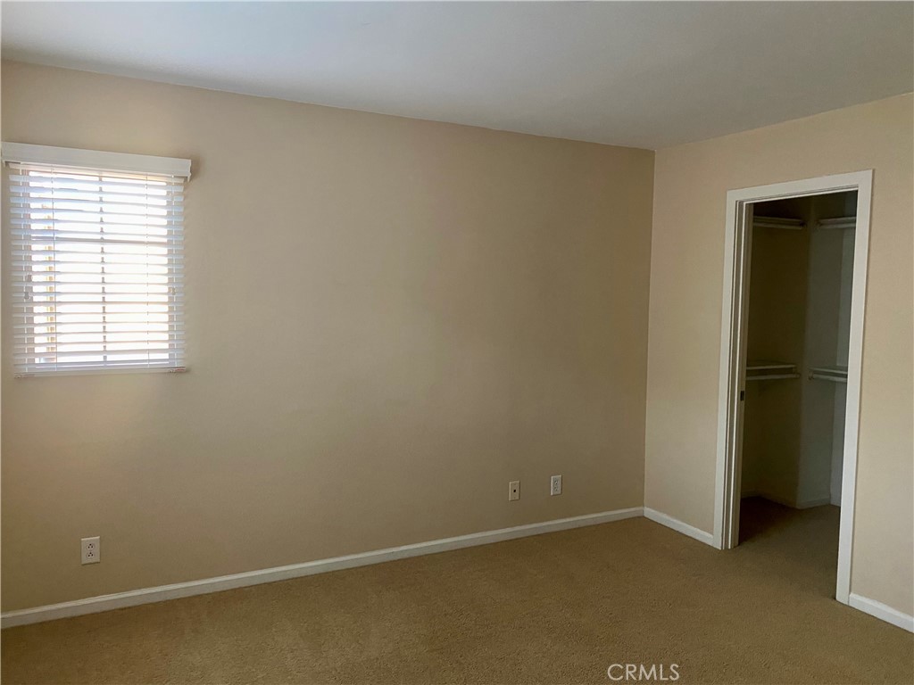 Bedroom with Walk in closet - 10 Iceberg Rose, Irvine CA 92620 - photo 17