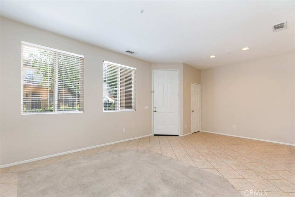 Front entry. *flooring to be updated with LVP prior to move-in. - 10 New Market, Irvine CA 92602 - photo 5