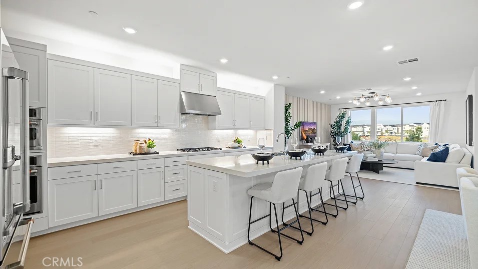 Photos shown are of model only- not actual homesite. - 100 Harrier, Irvine CA 92618 - photo 1