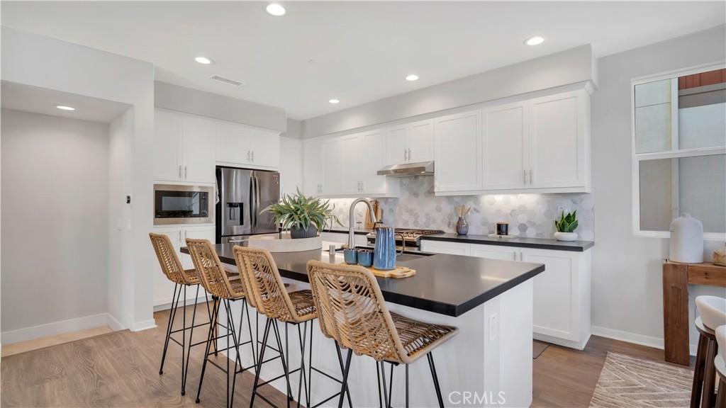 Upgraded Kitchen with Center Island - 100 Tenor, Irvine CA 92618 - photo 7