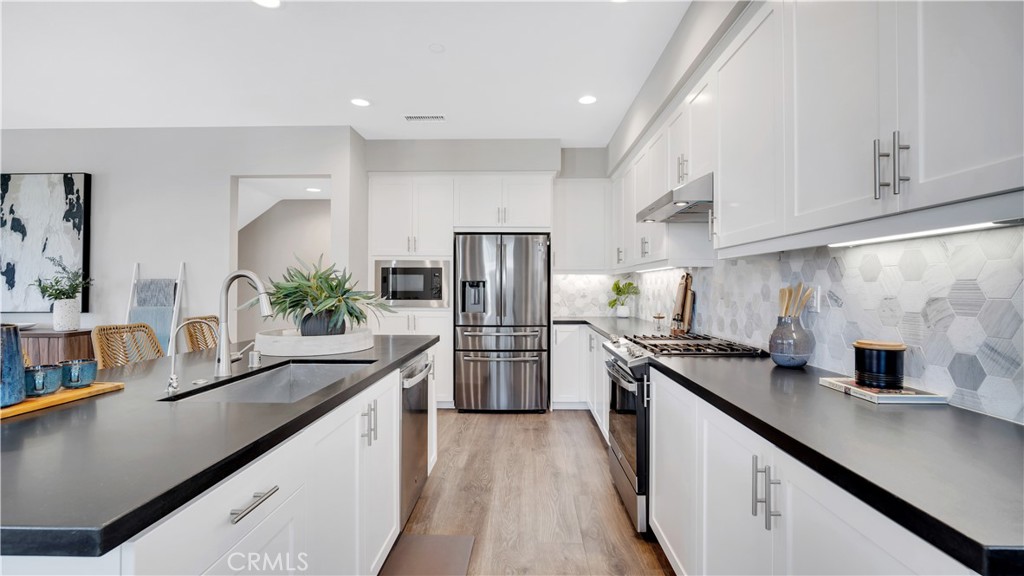 Kitchen - Matte Granite Counter with Hexagon Tile Backsplash - 100 Tenor, Irvine CA 92618 - photo 8