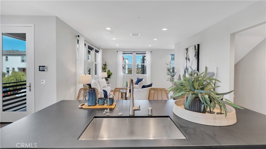 Kitchen - Open to Living Room - 100 Tenor, Irvine CA 92618 - photo 12