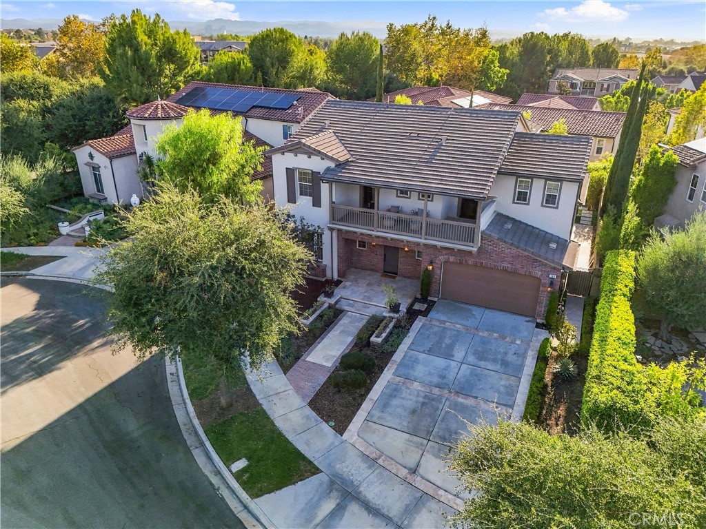 Situated on an expansive 7,212-square-foot lot, the residence encompasses approximately 3,779 square feet with 4 bedroom - 104 Sparrow, Irvine CA 92618 - photo 2