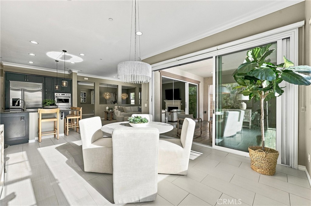 Dining area off kitchen, opens to California room - 104 Sparrow, Irvine CA 92618 - photo 21