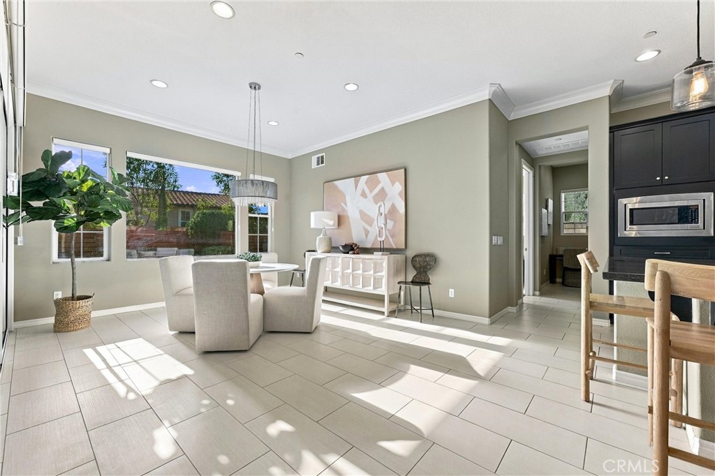 Dining area off kitchen, opens to California room - 104 Sparrow, Irvine CA 92618 - photo 23