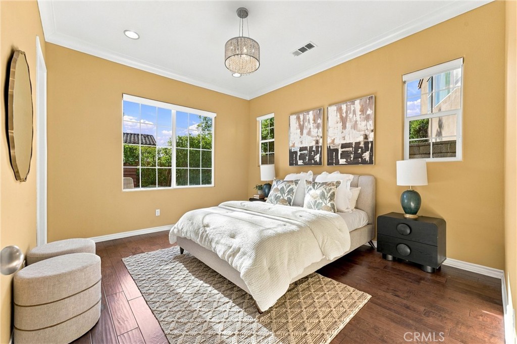 Main level bedroom suite - 104 Sparrow, Irvine CA 92618 - photo 32