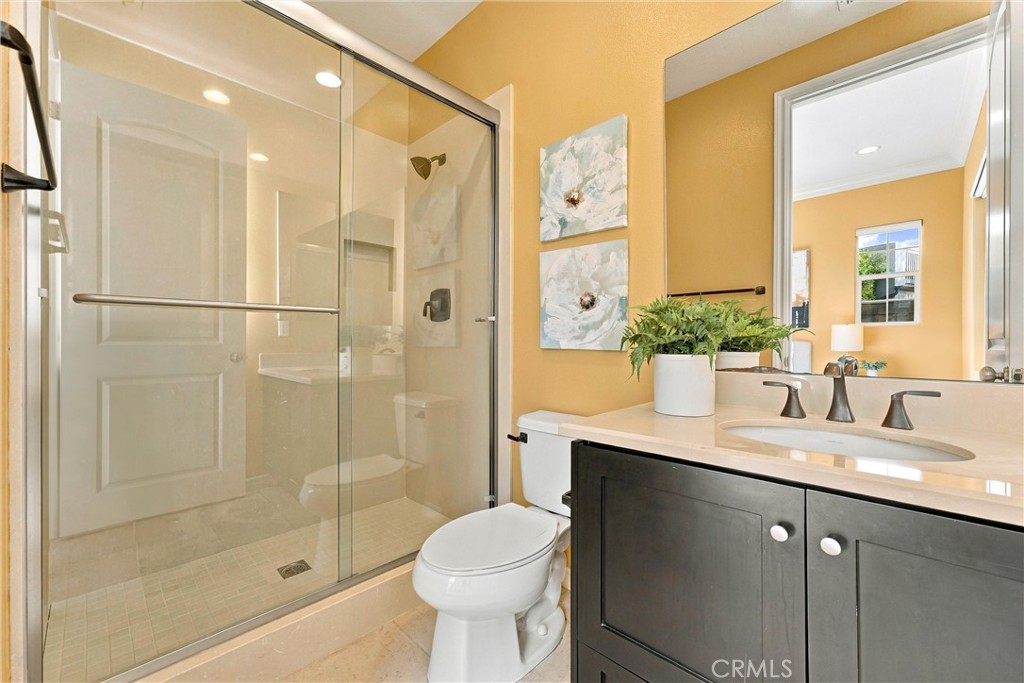 Main level bedroom suite - 104 Sparrow, Irvine CA 92618 - photo 34