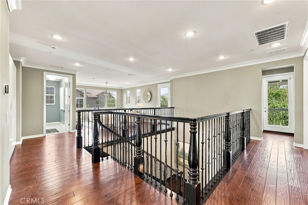 Upstairs, a generous loft offers additional space for relaxation or recreation. - 104 Sparrow, Irvine CA 92618 - photo 35