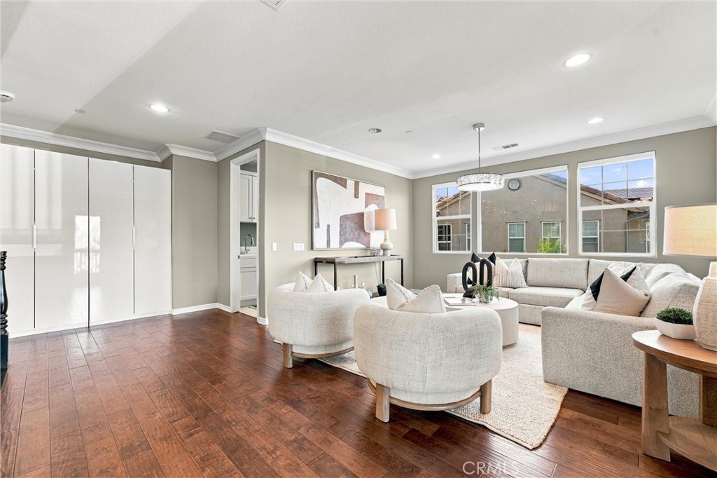 Upstairs, a generous loft offers additional space for relaxation or recreation. - 104 Sparrow, Irvine CA 92618 - photo 37