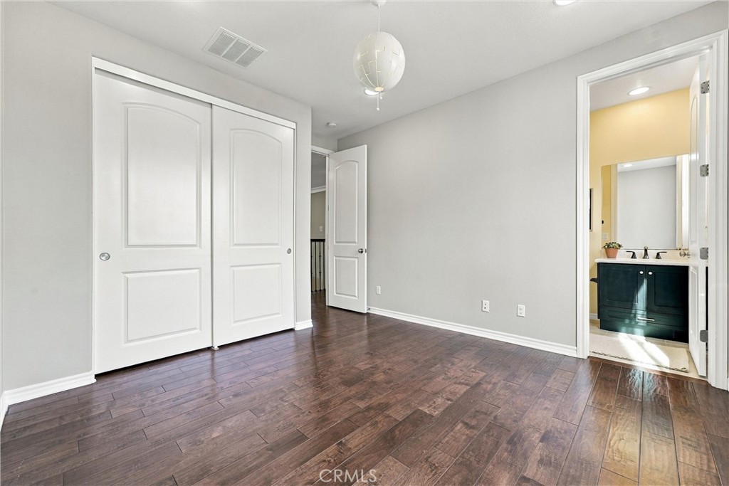 One of secondary bedrooms with ensuite bathroom - 104 Sparrow, Irvine CA 92618 - photo 54