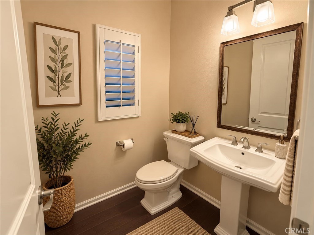 Virtually staged - first floor half bath. - 104 Strawberry Grove, Irvine CA 92620 - photo 6