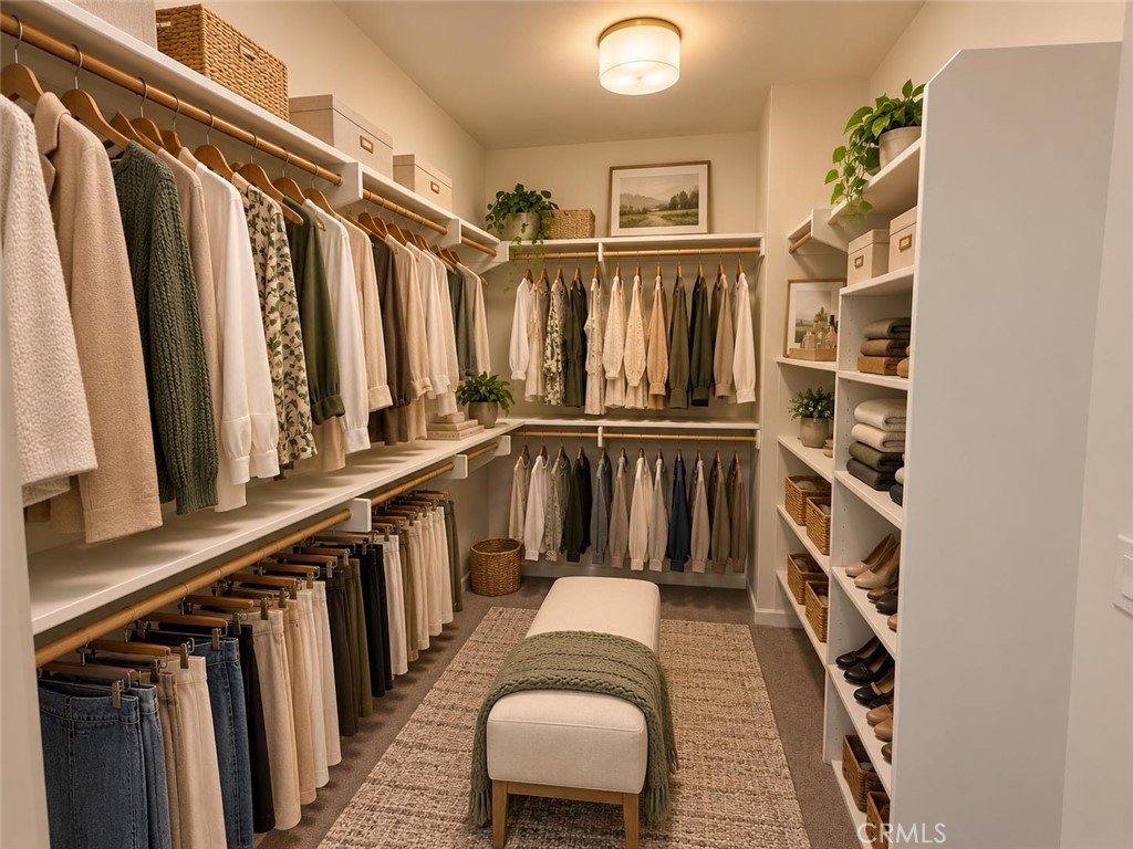 Virtually staged - Primary Bedroom walk-in closet. - 104 Strawberry Grove, Irvine CA 92620 - photo 8