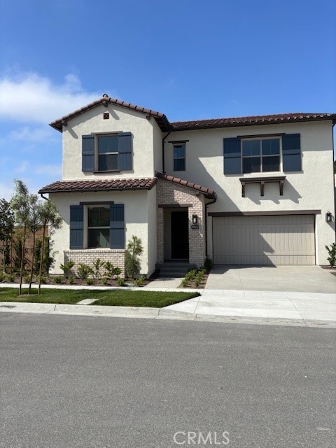 Exterior front view of the Home - 104 Sunnybank, Irvine CA 92618 - photo 1