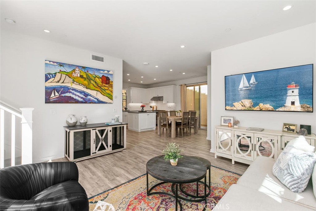 Upgraded flooring (LVF) and an open concept space with mountain views and gorgeous walking paths just out the front door - 105 Anthology, Irvine CA 92618 - photo 4