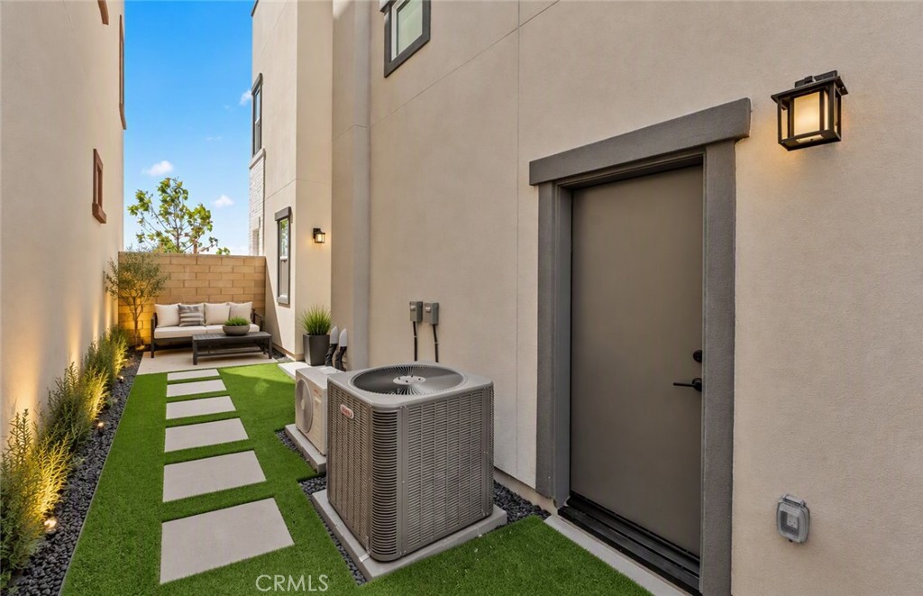 Side Yard - Digitally enhanced for visualization purposes - 105 Moody, Irvine CA 92618 - photo 32