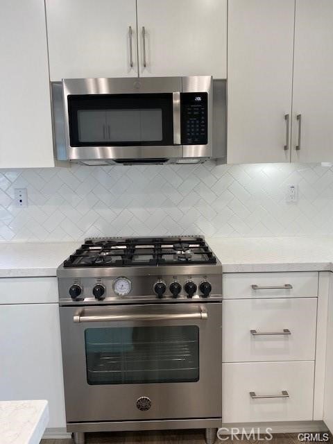 High end cooktop. - 105 Outwest, Irvine CA 92618 - photo 6