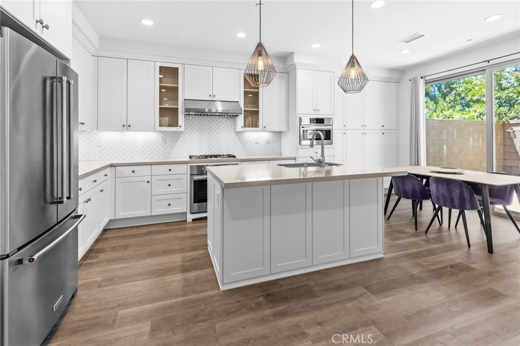 Kitchen and dinning area - 106 Okra, Irvine CA 92618 - photo 5