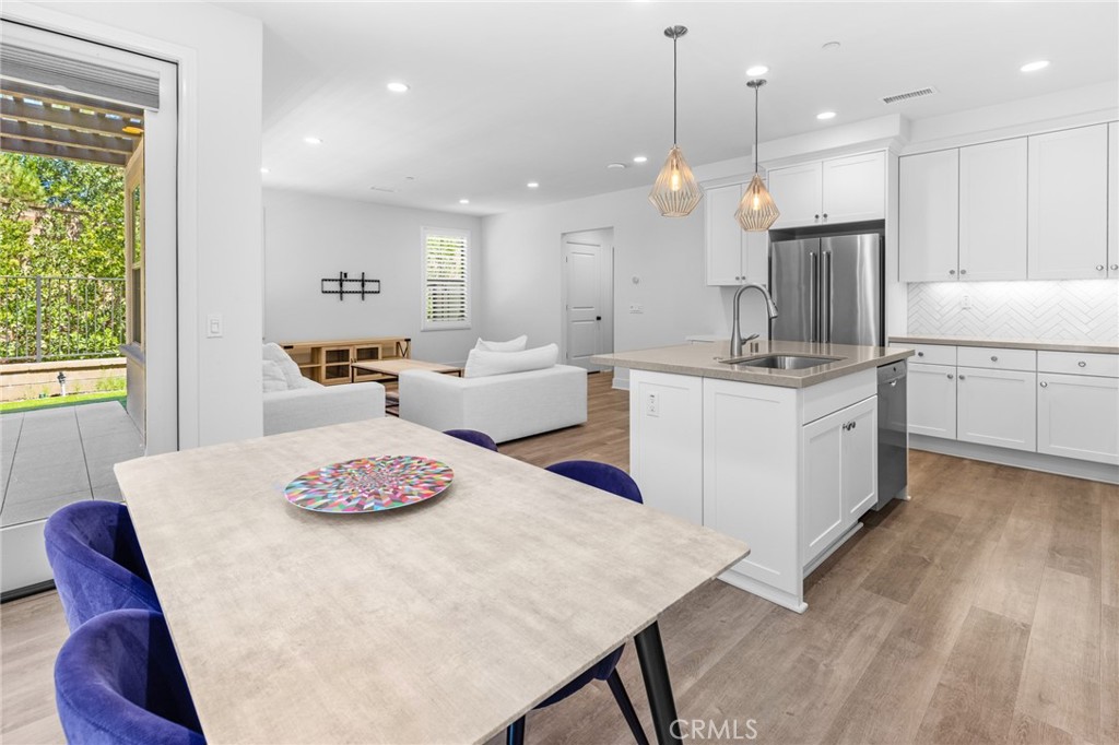 Dinning area and kitchen - 106 Okra, Irvine CA 92618 - photo 11