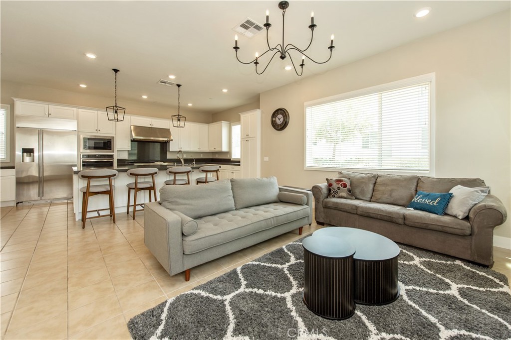 Open concept living/ kitchen - 107 Pitch, Irvine CA 92618 - photo 3