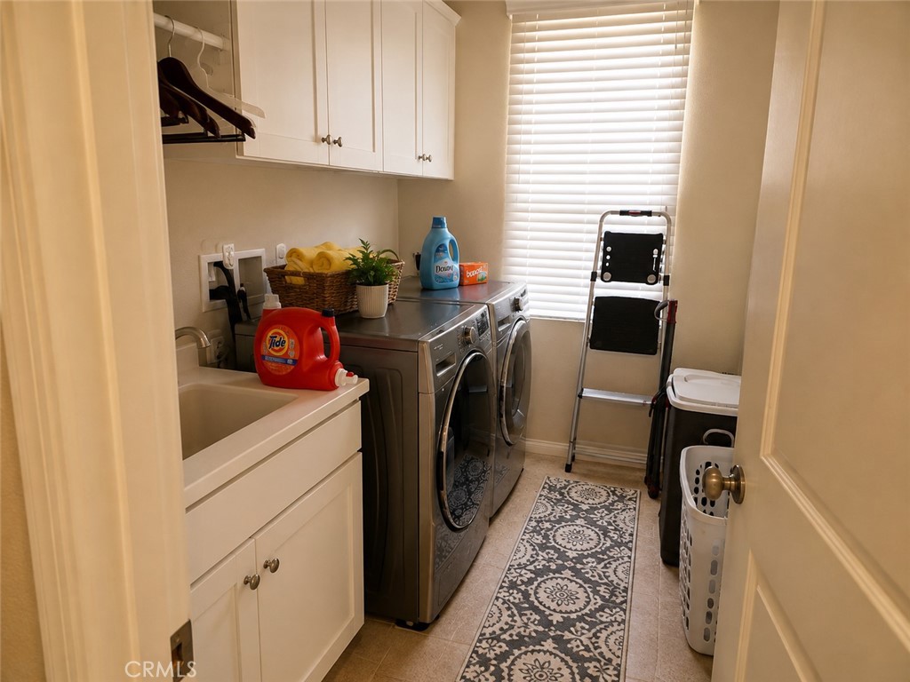 Upstairs laundry (washer/dryer not included) - 108 Summer Lilac, Irvine CA 92620 - photo 13