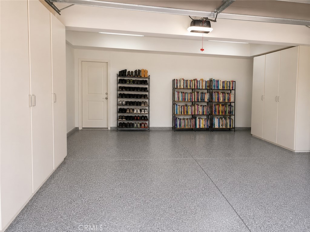 Garage with beautiful epoxy floors - 108 Summer Lilac, Irvine CA 92620 - photo 19