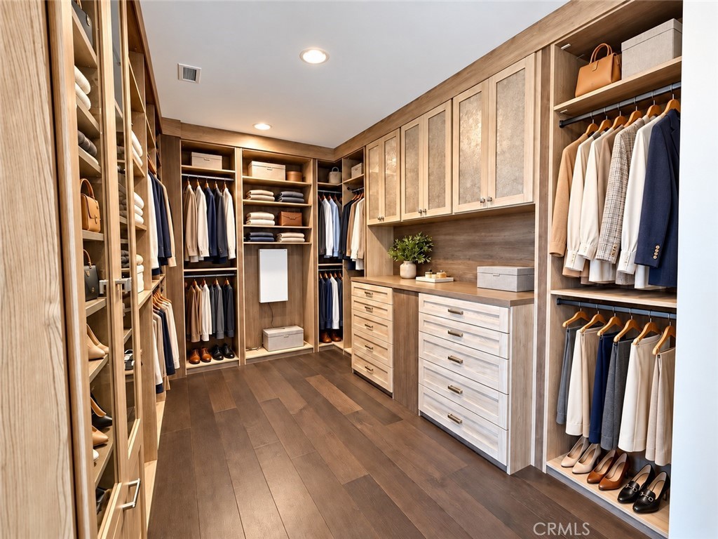 AI staged master closet - 109 Heather Mist, Irvine CA 92618 - photo 10