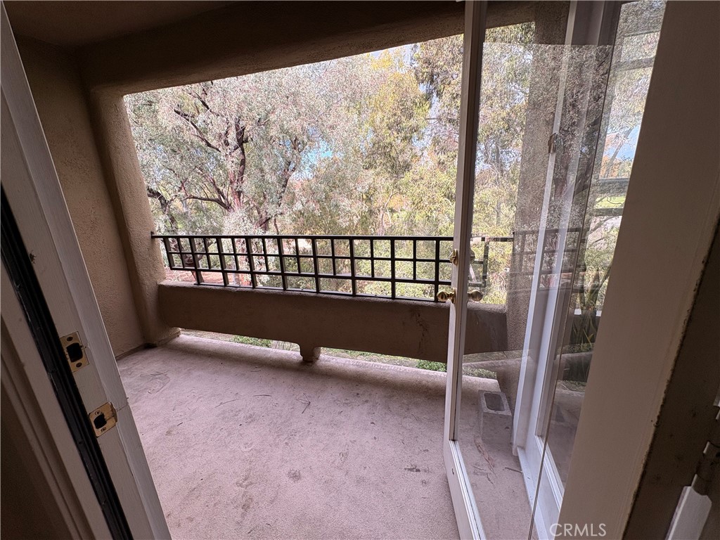 Primary suite balcony over looking park - 109 Lehigh Aisle, Irvine CA 92612 - photo 12