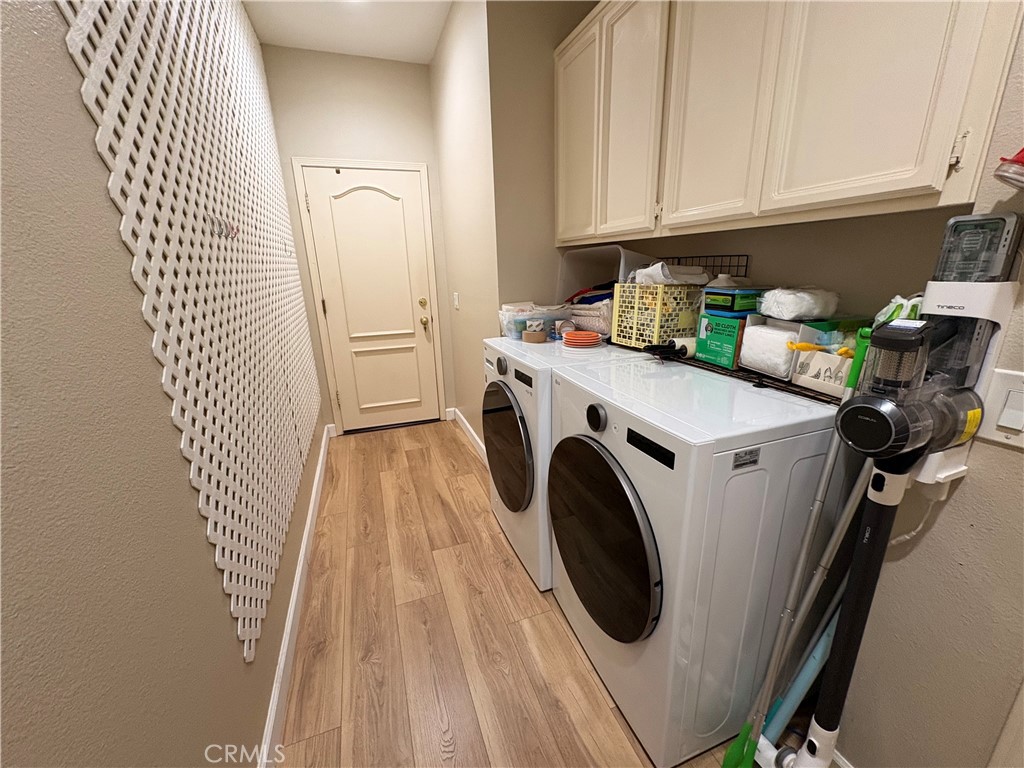 Laundry area and door for the Garage - 109 Lehigh Aisle, Irvine CA 92612 - photo 17