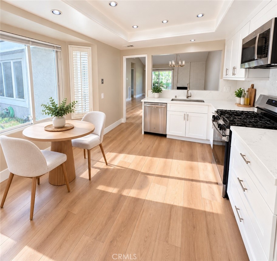 Virtually staged kitchen - 11 Beechwood, Irvine CA 92604 - photo 8