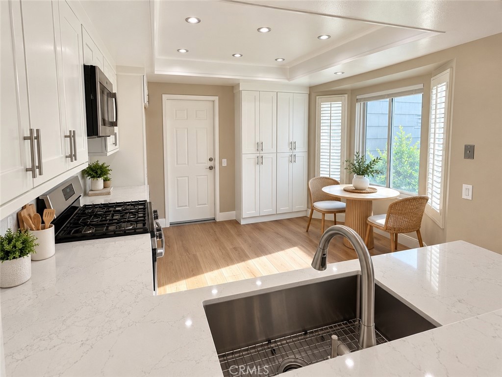 Virtually staged kitchen - 11 Beechwood, Irvine CA 92604 - photo 10