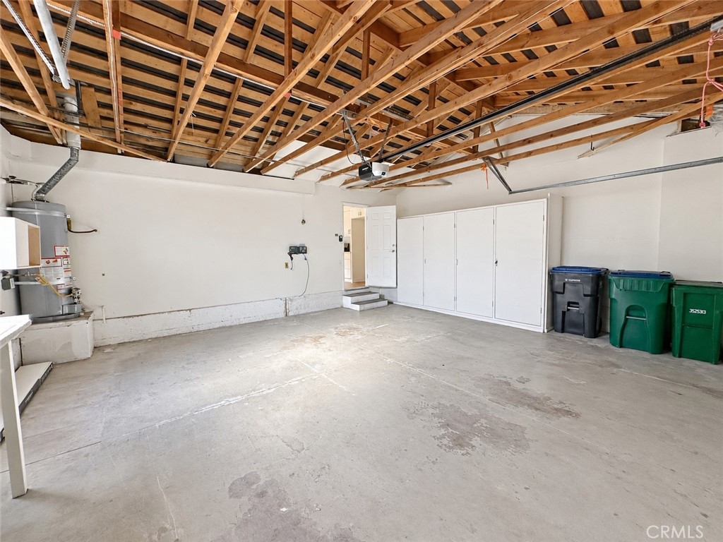 Spacious garage with storage cabinets - 11 Beechwood, Irvine CA 92604 - photo 26
