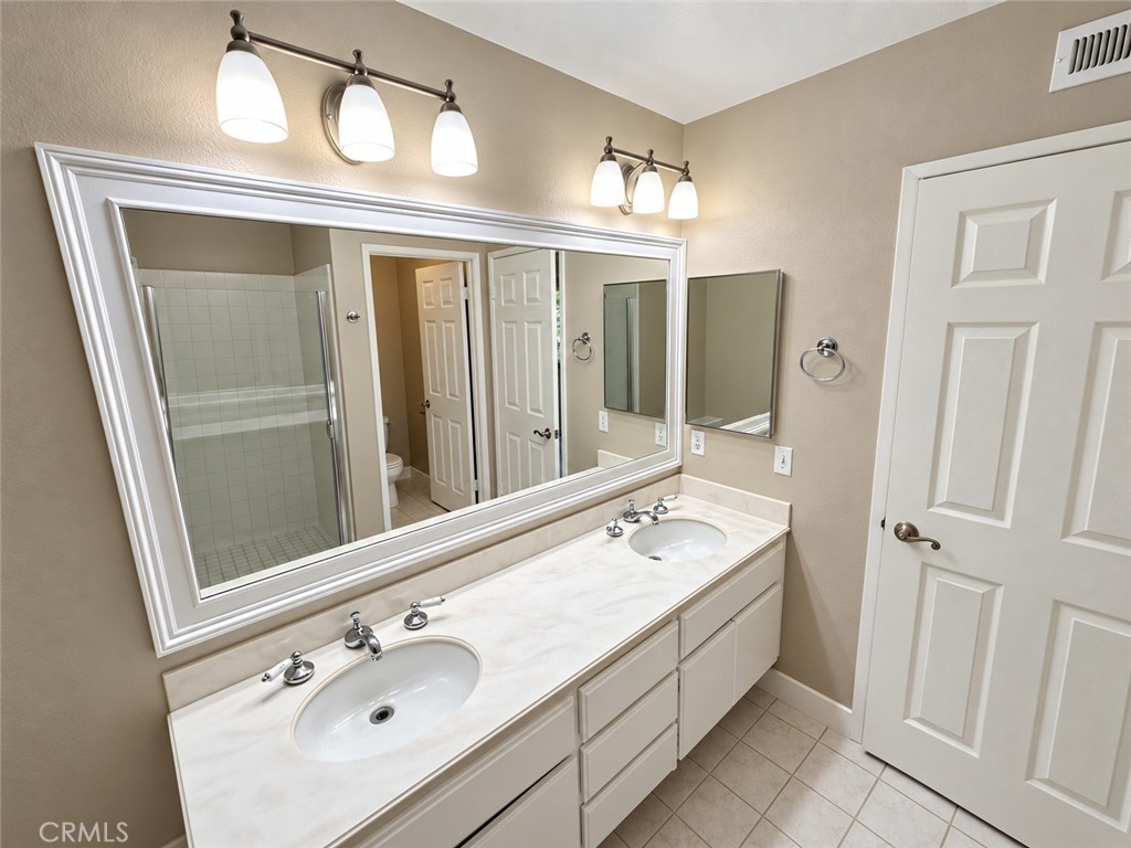 Primary bathroom vanity - 11 Beechwood, Irvine CA 92604 - photo 14