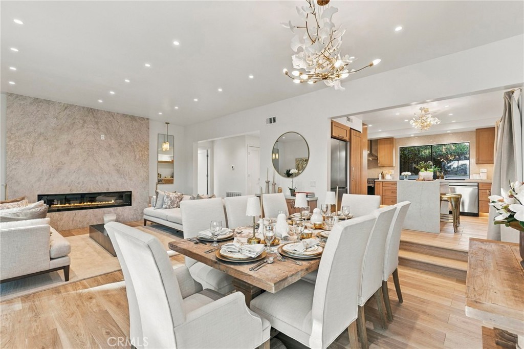 Open concept allows for easy entertaining from living room to dining room - 11 Palos 55, Irvine CA 92612 - photo 6