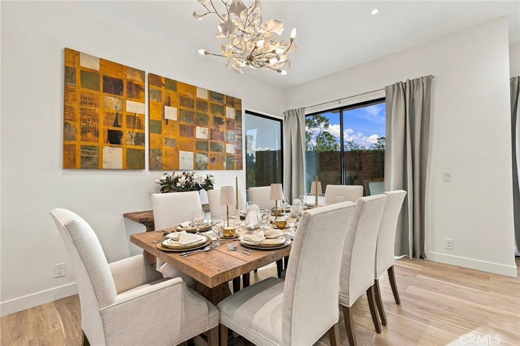 Effortless access from the dining room to the beautiful outdoor patio - 11 Palos 55, Irvine CA 92612 - photo 8