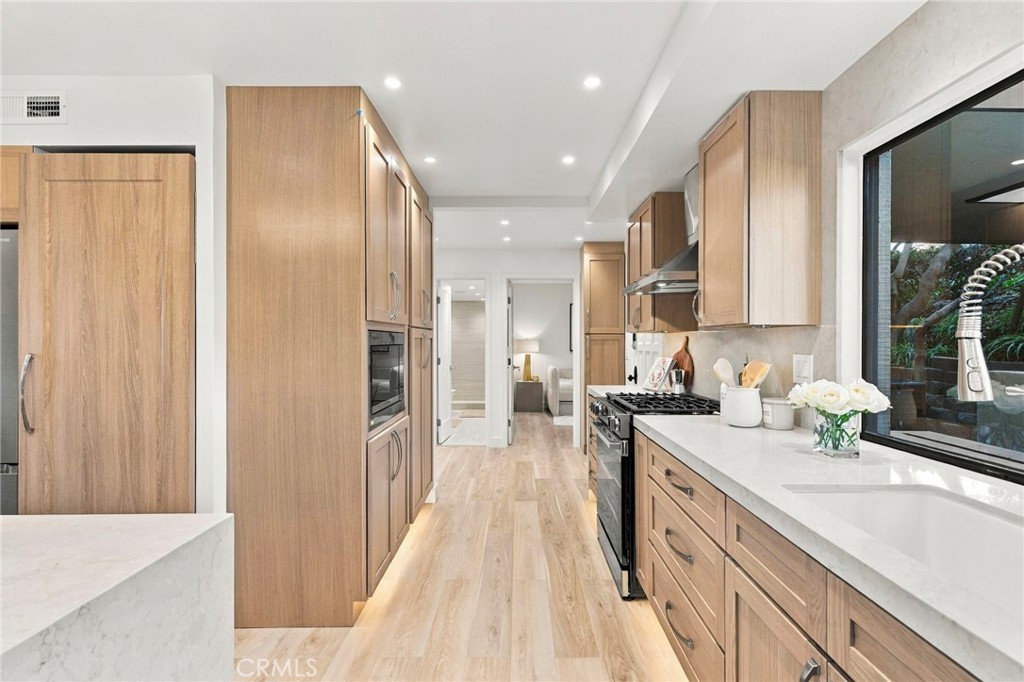 Stone countertops and custom cabinetry - 11 Palos 55, Irvine CA 92612 - photo 11
