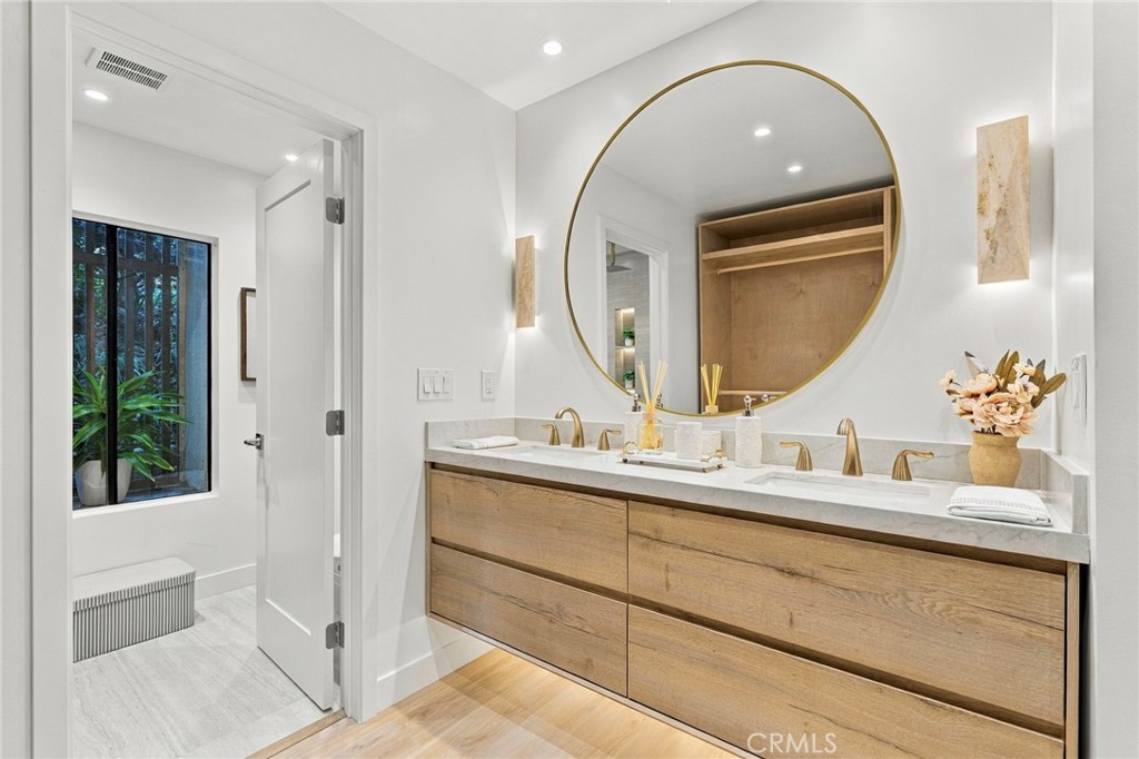 Primary Bathroom with double sink and stone countertop - 11 Palos 55, Irvine CA 92612 - photo 19